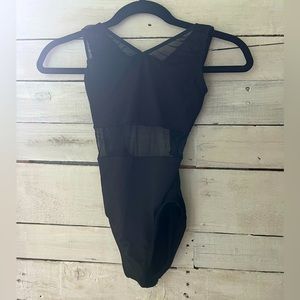 Motionwear black leo with mesh cut out. Size small—worn once!